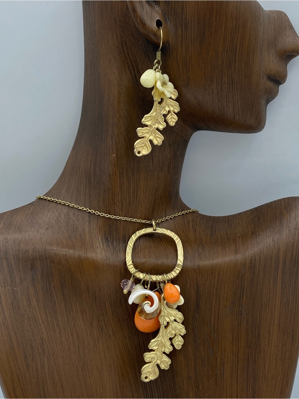 Gold Tone Pendant Necklace with Shells and Seaweed Charm matching earrings set